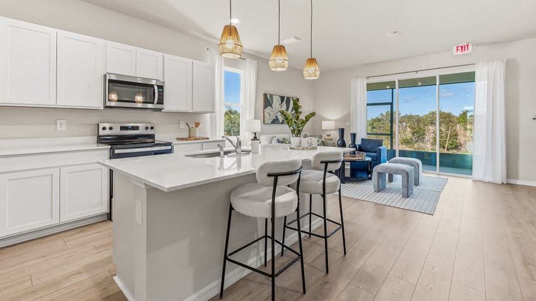Furnished interior in a model home at The Gardens at Bay Street in Sarasota (Image 7). Furnished interior in a model home at The Gardens at Bay Street in Sarasota (Image 7).