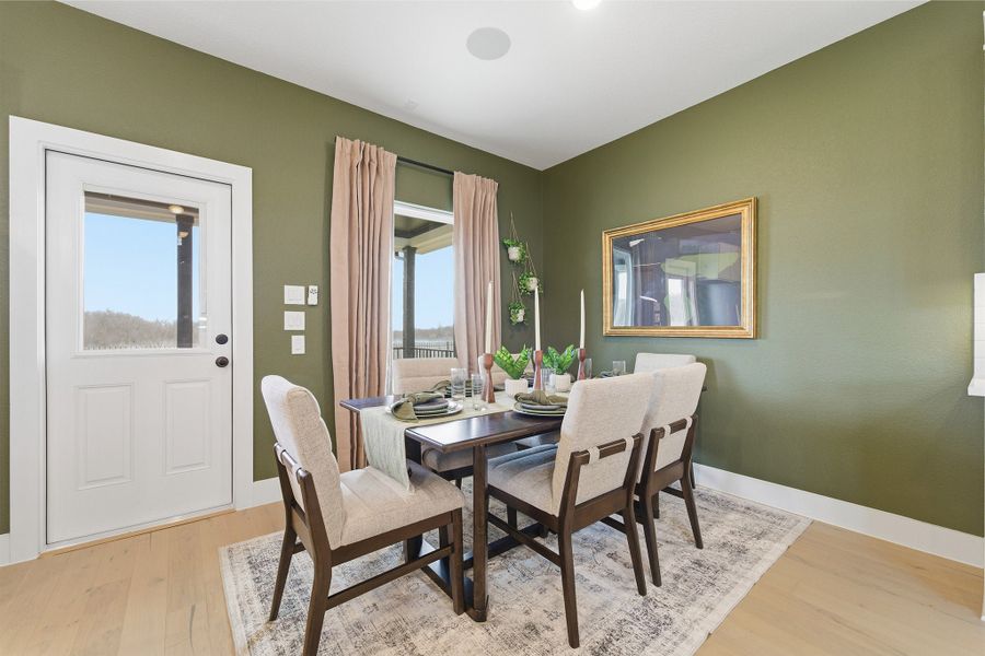 Furnished interior in a model home at Infinity Square in Kyle (Image 12).