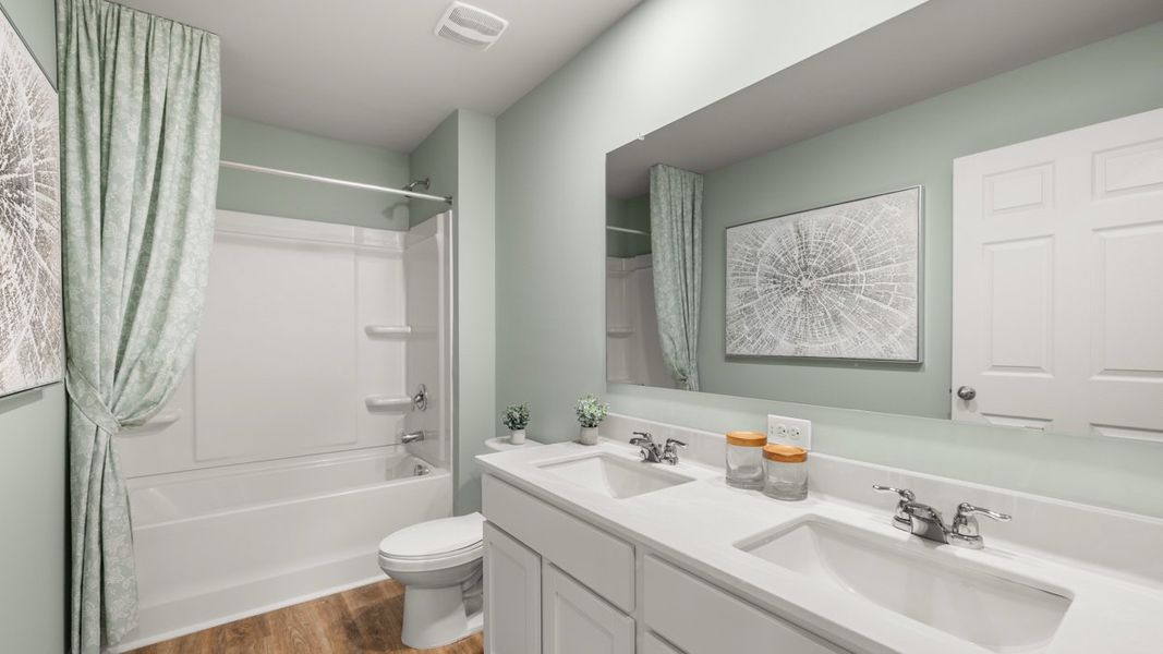 Furnished interior in a model home at Twin Lakes in Hoschton (Image 57).