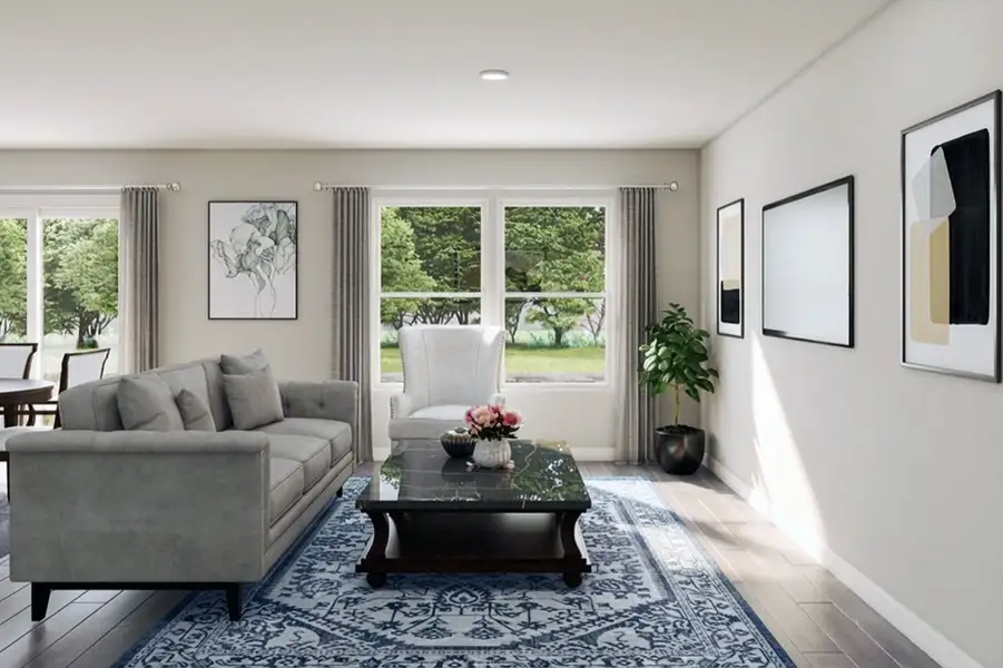 Furnished interior in a model home at Whispering Winds in Alvord (Image 3).