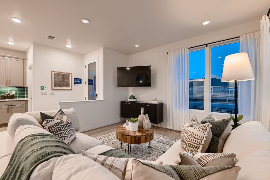 Furnished interior in a model home at Parkway at Prairie Center Village in Brighton (Image 6).