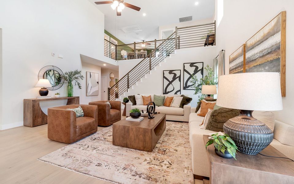 Furnished interior in a model home at Grande Estates in Bertram (Image 17).