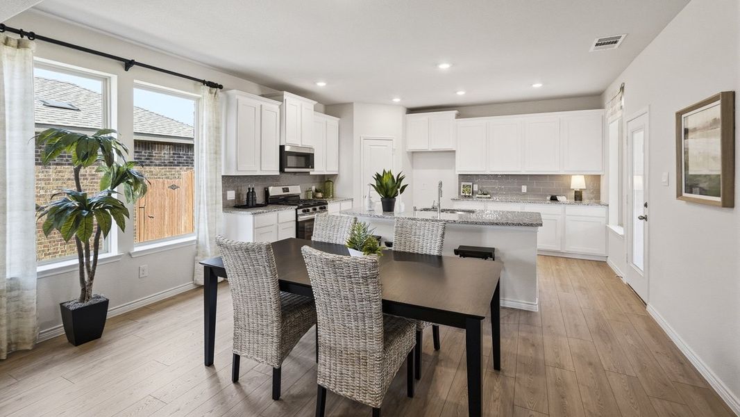 Furnished interior in a model home at The Woods at Lindsey Place in Anna (Image 30).