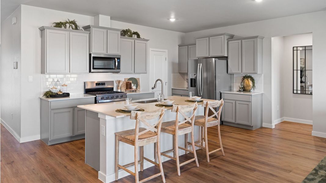 Furnished interior in a model home at King's Landing in Corpus Christi (Image 4).