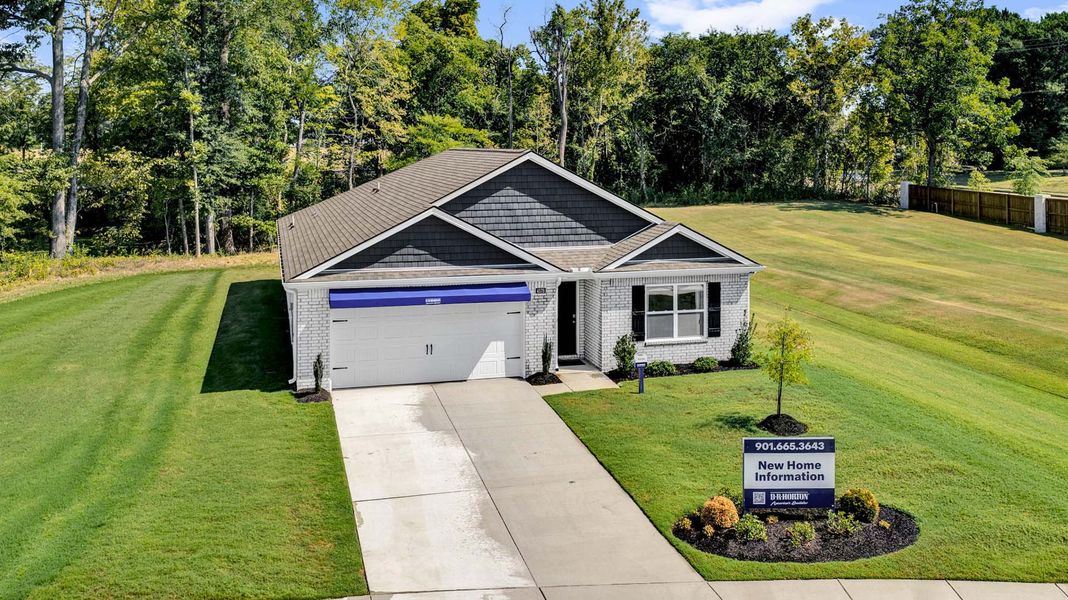 Front exterior of a home in the Riggs Pointe community, located in Millington, TN (Image 4).