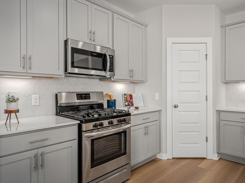 Furnished interior in a model home at Sage Farms in White House (Image 19).