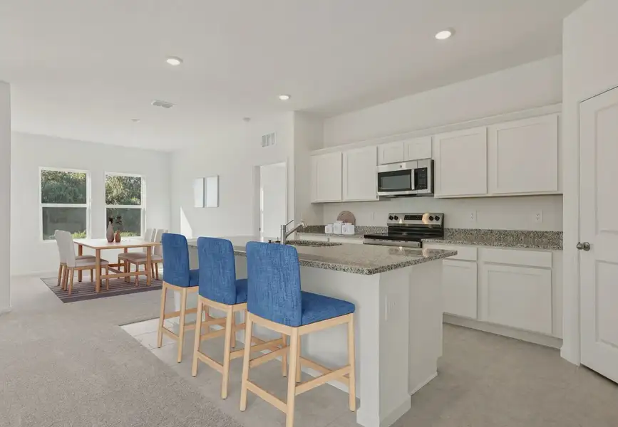 Furnished interior in a model home at Landings at Mount Olive in Polk City (Image 5).