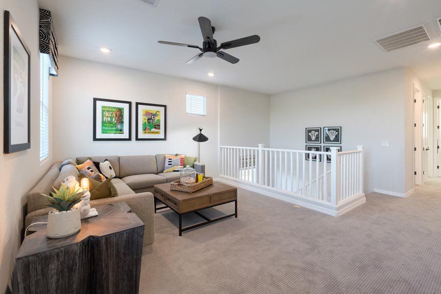 Furnished interior in a model home at Ryder Ranch in Surprise (Image 43).