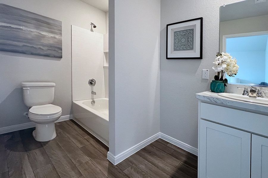 Furnished interior in a model home at Dowdy Ferry in Dallas (Image 6).