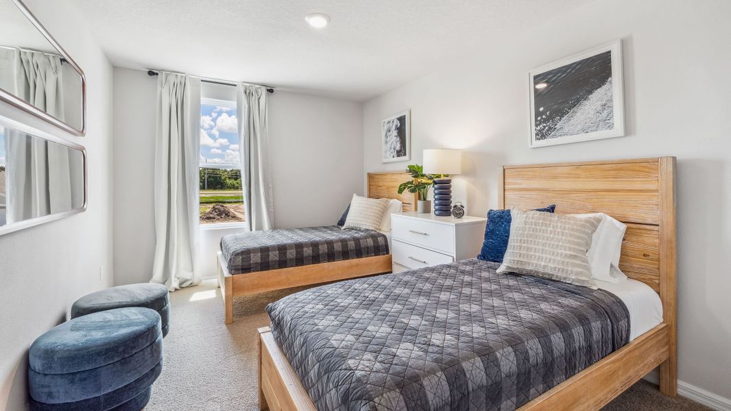 Furnished interior in a model home at Bella Lago in Parrish (Image 27).