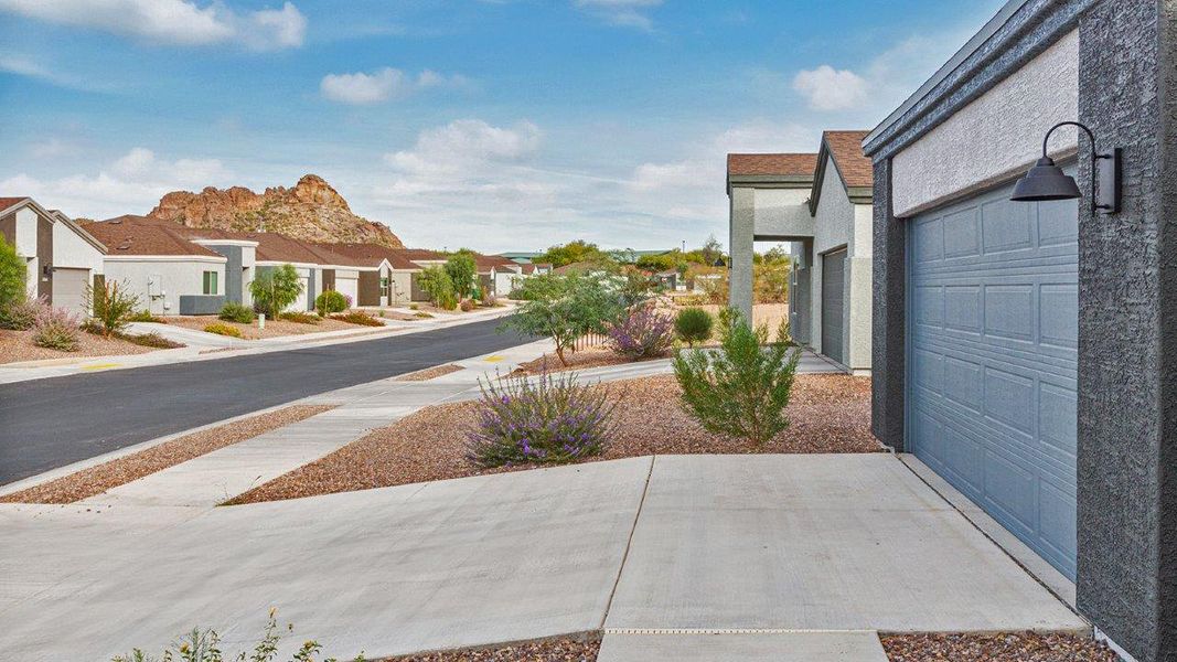 Front exterior of a home in the Roadrunner Estates community, located in Tucson, AZ (Image 6).