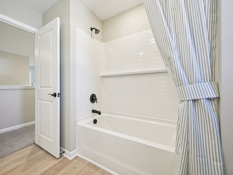Secondary bathroom in the Johnson floorplan at a Meritage Homes community in Raleigh, NC. Secondary bathroom in the Johnson floorplan at a Meritage Homes community in Raleigh, NC.