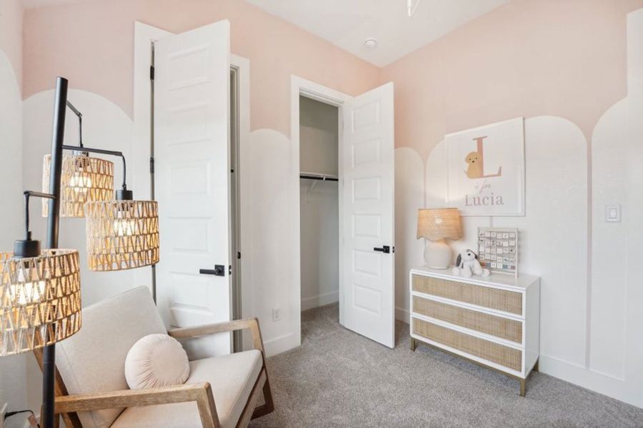 Furnished interior in a model home at Grande Estates in Bertram (Image 12).