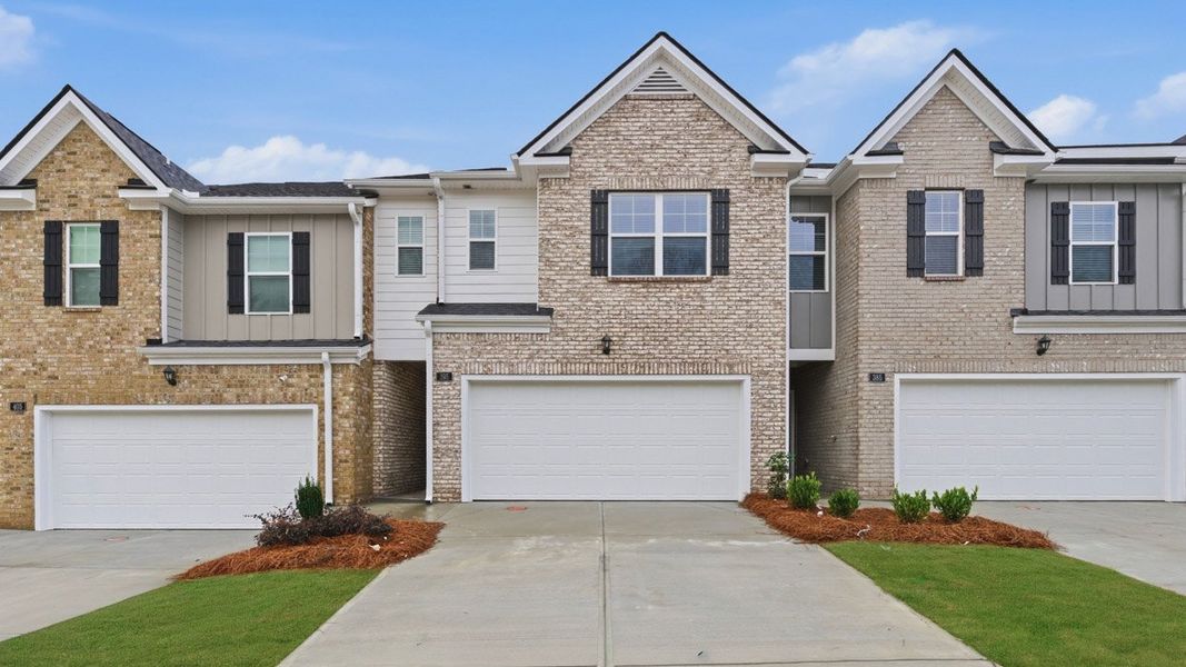 Front exterior of a home in the Independence Villas and Townhomes community, located in Loganville, GA (Image 32).
