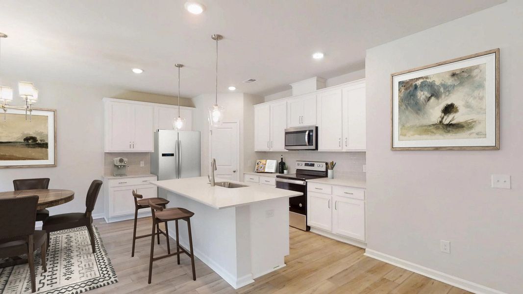 Furnished interior in a model home at Tea Farm: Lake Series in Ravenel (Image 16).