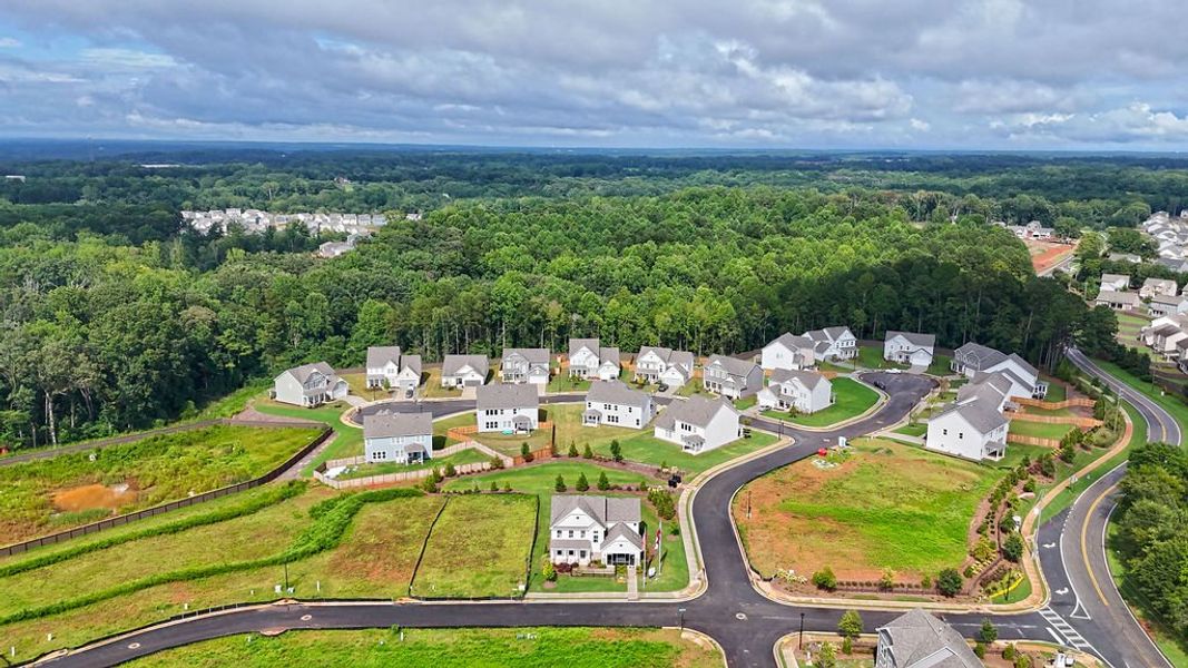 Aerial view of the Maddox Landing community in Hoschton, GA, showing layout and nearby surroundings (Image 10). Aerial view of the Maddox Landing community in Hoschton, GA, showing layout and nearby surroundings (Image 10).