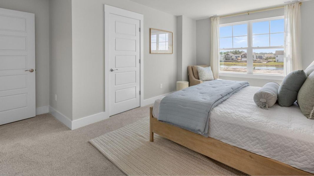 Furnished interior in a model home at The Landing at Sidbury Station in Castle Hayne (Image 30).