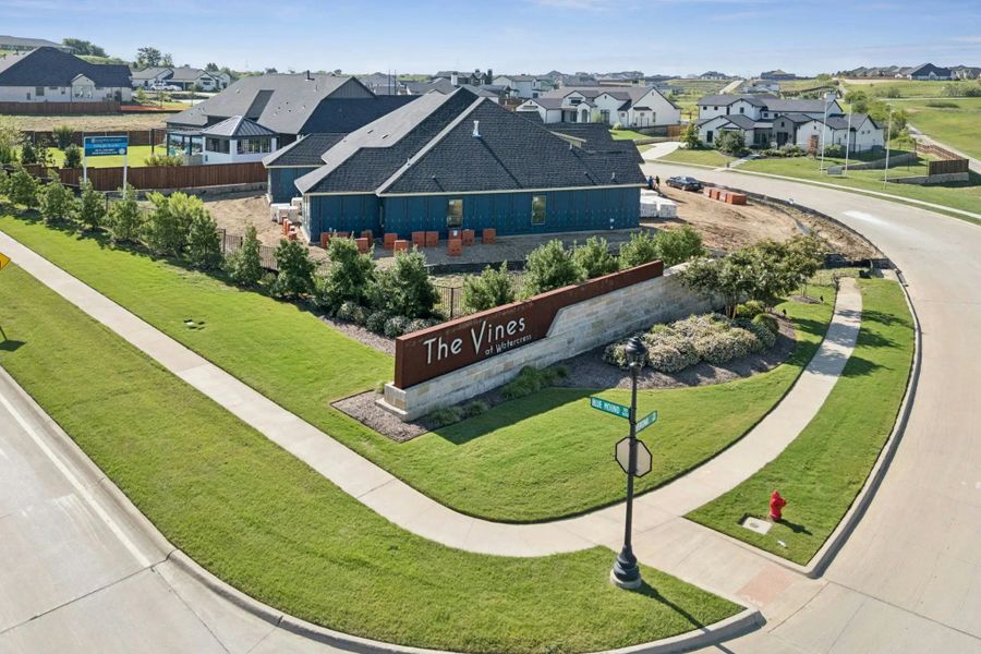 Main entrance to the The Vines master-planned community in Haslet, TX, featuring its landmark signage (Image 9). Main entrance to the The Vines master-planned community in Haslet, TX, featuring its landmark signage (Image 9).
