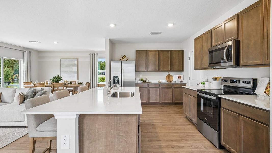 Furnished interior in a model home at Waterstone in Tampa (Image 19).
