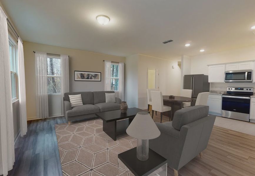 Furnished interior in a model home at Clinton Townhomes in Dade City (Image 5).