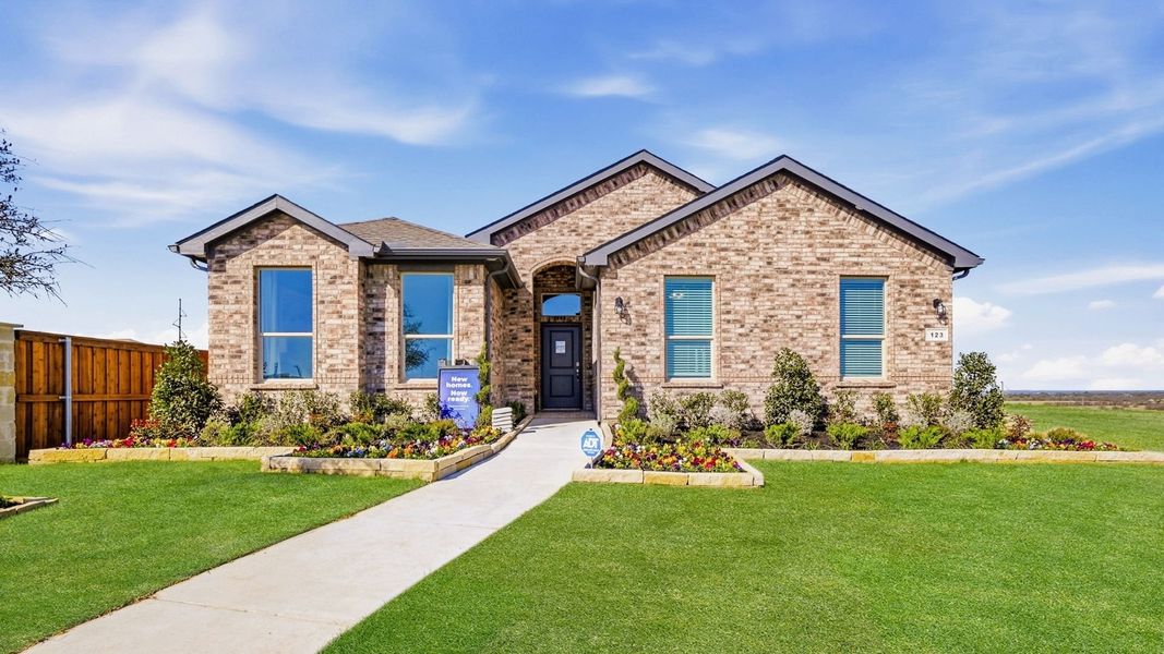 Front exterior of a home in the Bluestem community, located in Rhome, TX (Image 4).