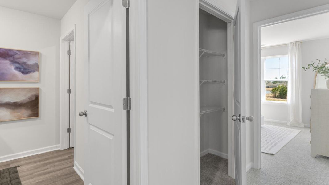 Furnished interior in a model home at The Grove at Blake Farm in Wilmington (Image 40). Furnished interior in a model home at The Grove at Blake Farm in Wilmington (Image 40).