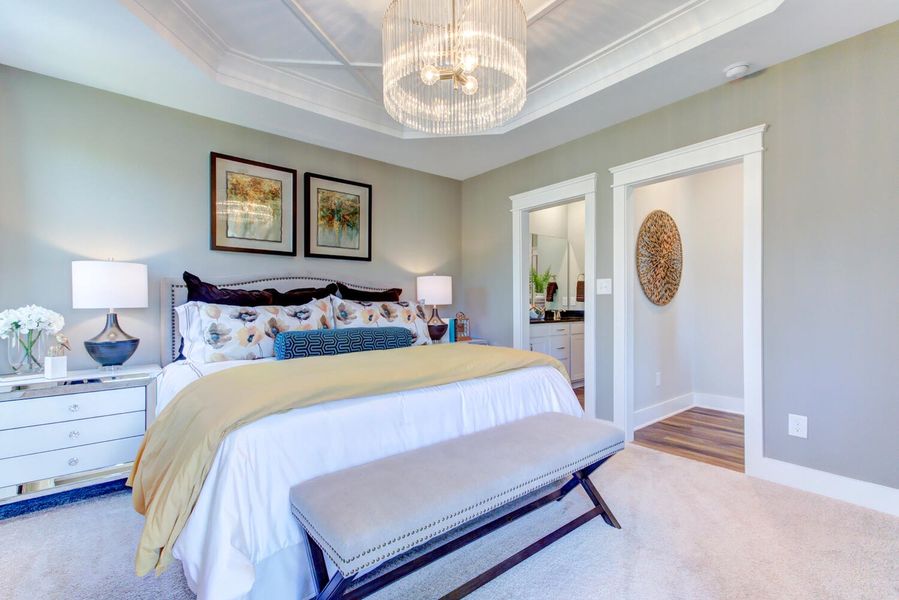 Furnished interior in a model home at 1158 Place Townhomes in Wilson (Image 4). Furnished interior in a model home at 1158 Place Townhomes in Wilson (Image 4).