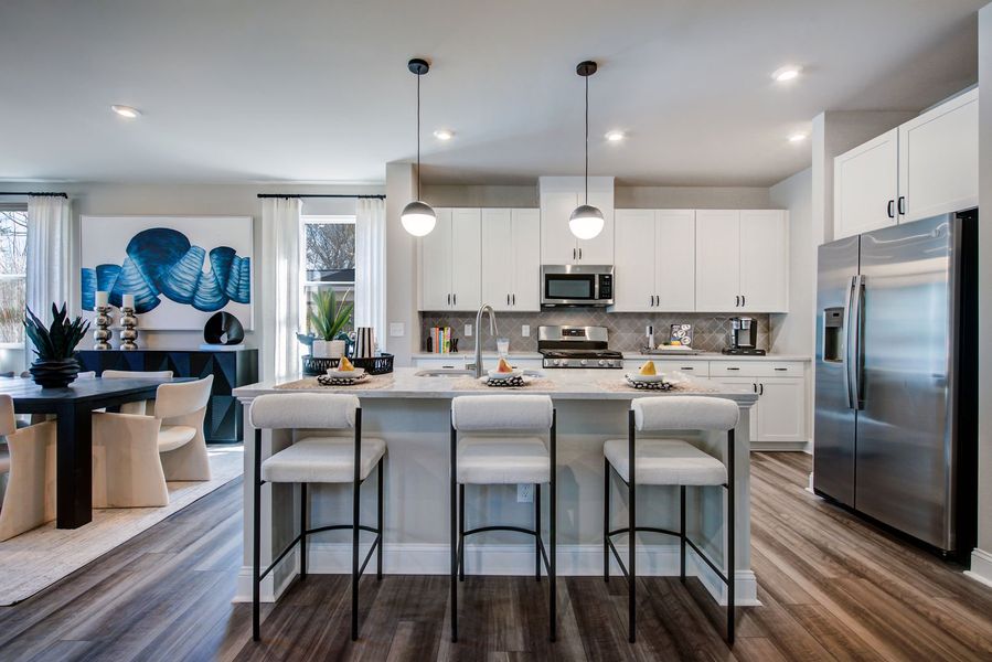 Designer-inspired kitchens with large center islands Designer-inspired kitchens with large center islands