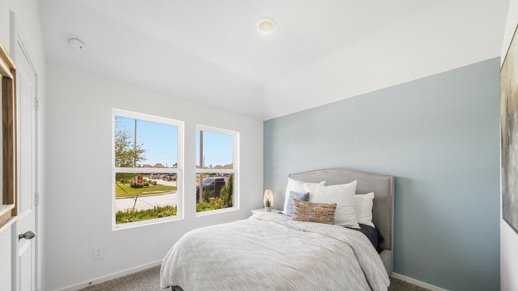 Furnished interior in a model home at Sunterra in Katy (Image 34).