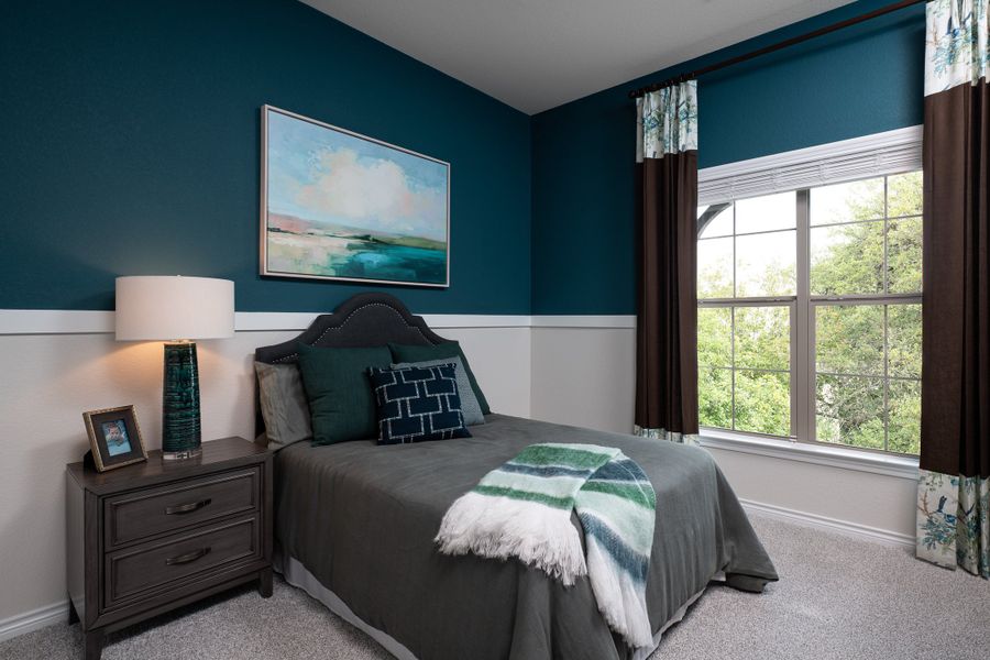 Furnished interior in a model home at Oak Hills in Cross Timber (Image 13).