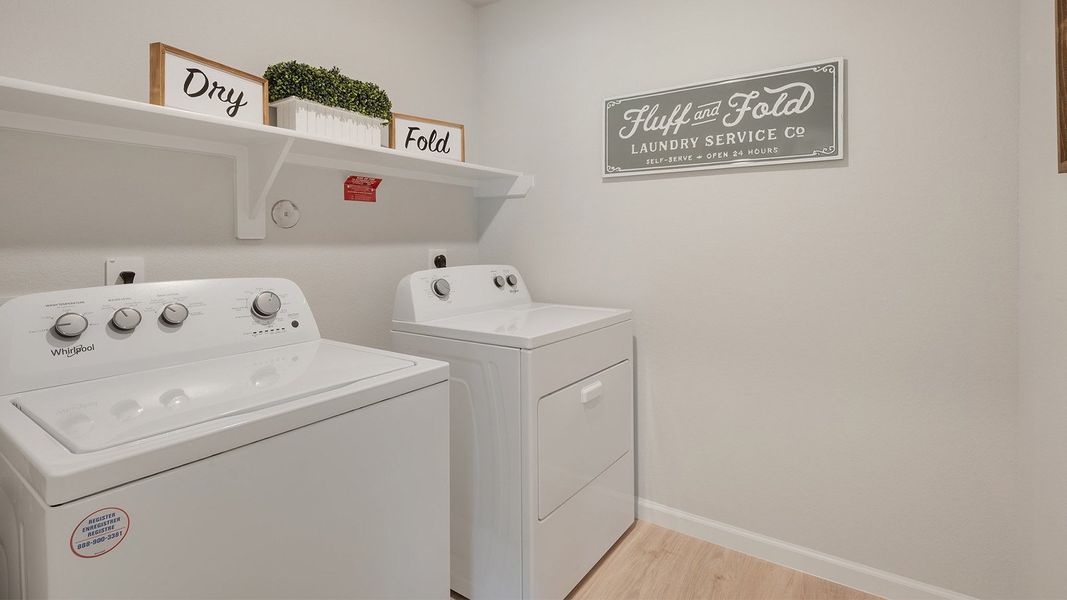 Furnished interior in a model home at Liberty Village in Brenham (Image 8).