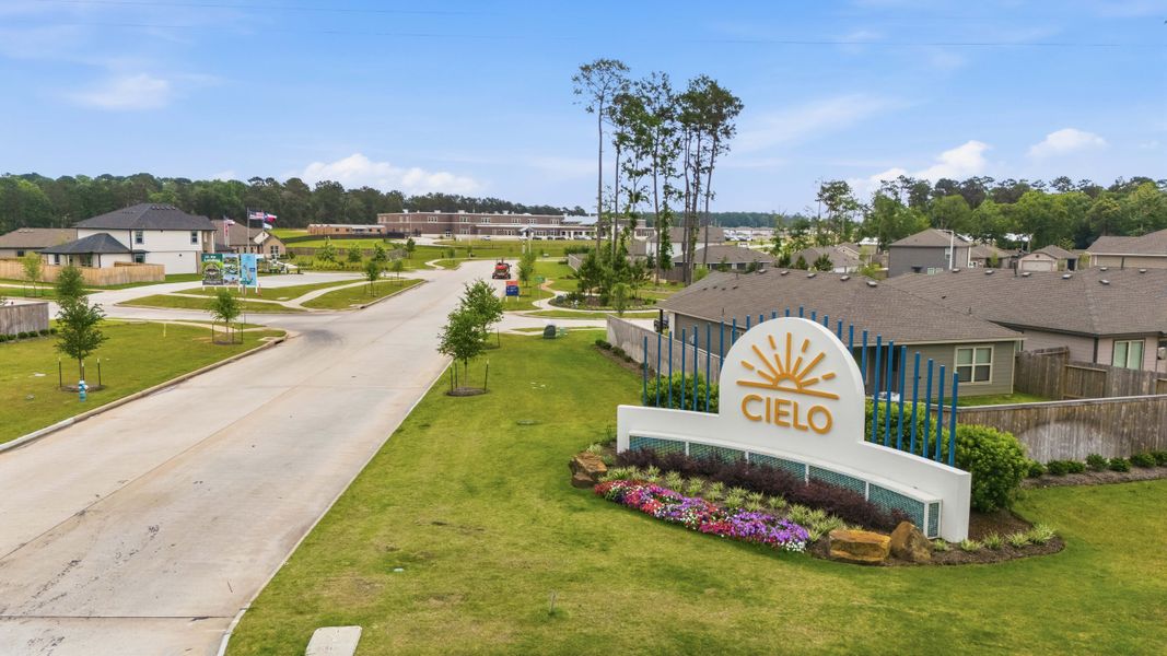 Entrance to the Cielo community in Conroe, TX, featuring signage and landscaping (Image 16). Entrance to the Cielo community in Conroe, TX, featuring signage and landscaping (Image 16).