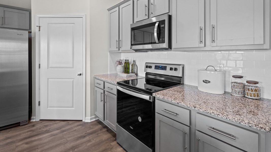 Furnished interior in a model home at East Ridge in Ayden (Image 14).