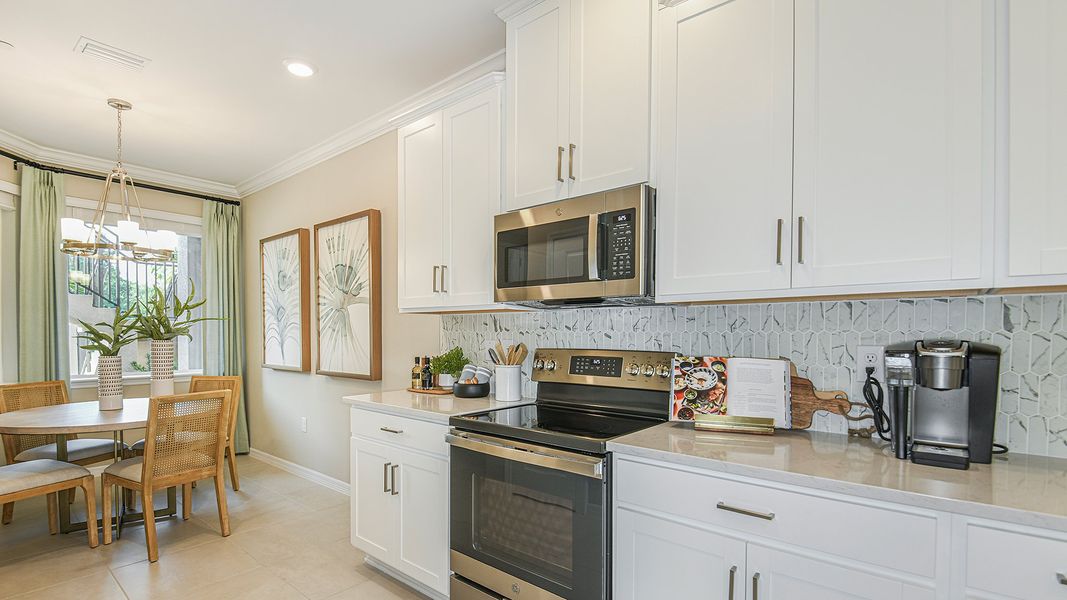 Furnished interior in a model home at Bella Via in Port Charlotte (Image 6). Furnished interior in a model home at Bella Via in Port Charlotte (Image 6).
