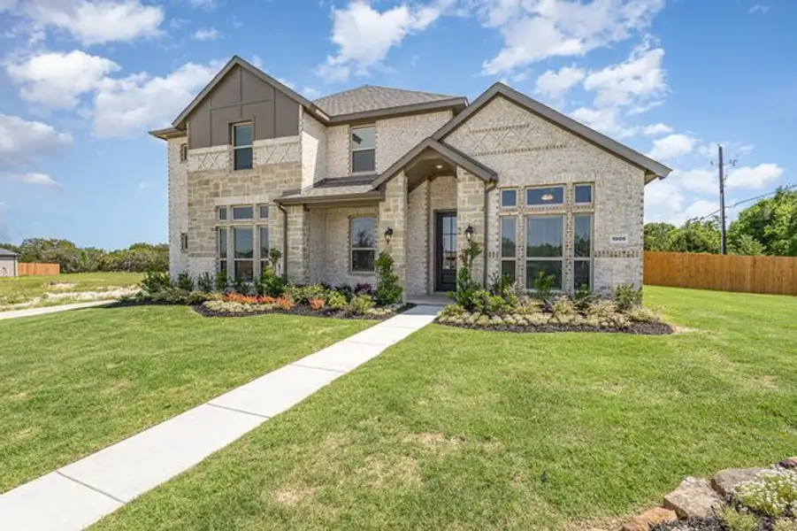 Front exterior of a home in the Ten Mile Creek Estates community, located in DeSoto, TX (Image 10). Front exterior of a home in the Ten Mile Creek Estates community, located in DeSoto, TX (Image 10).