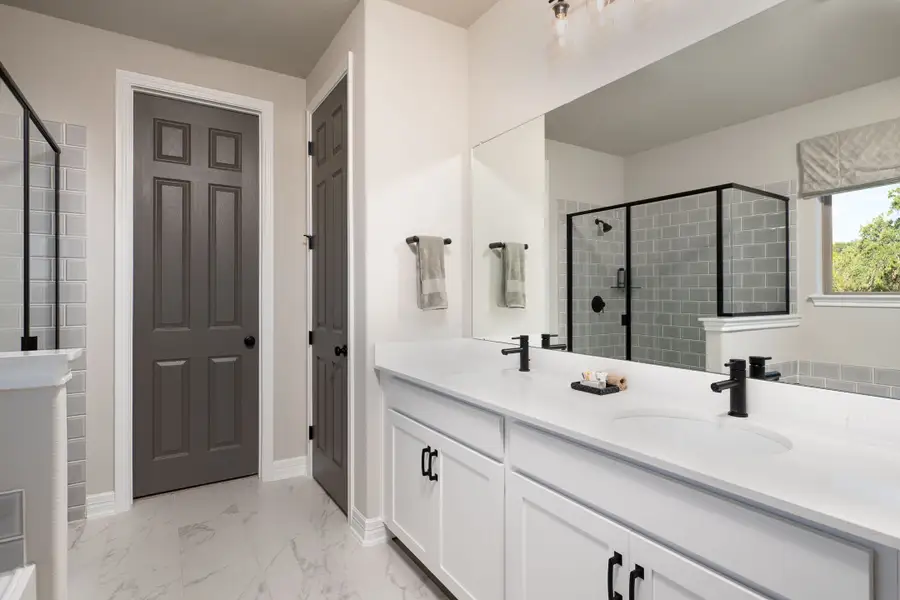 Furnished interior in a model home at Sunterra 50ft in Katy (Image 6).