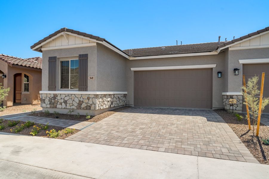 Front exterior of a home in the Mira Vista at Victory community, located in Buckeye, AZ (Image 6).