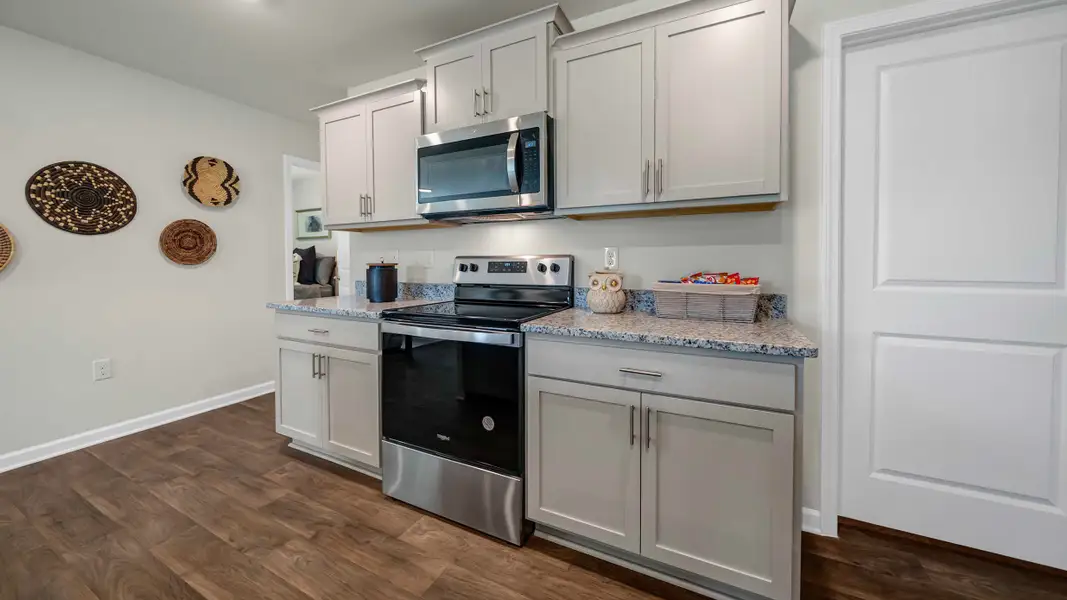 Furnished interior in a model home at South Haven in Camden (Image 10).