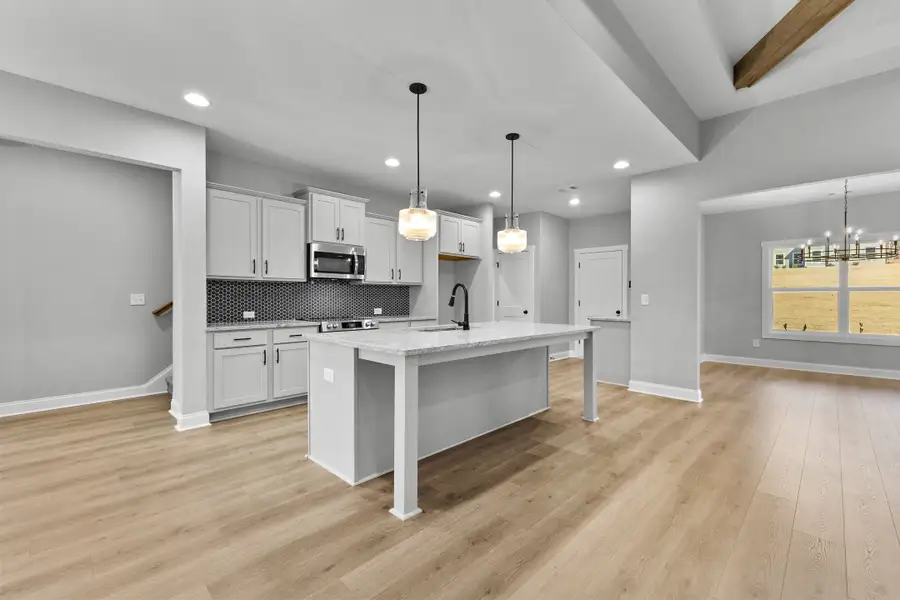 Furnished interior in a model home at Deer Creek in Moreland (Image 5).