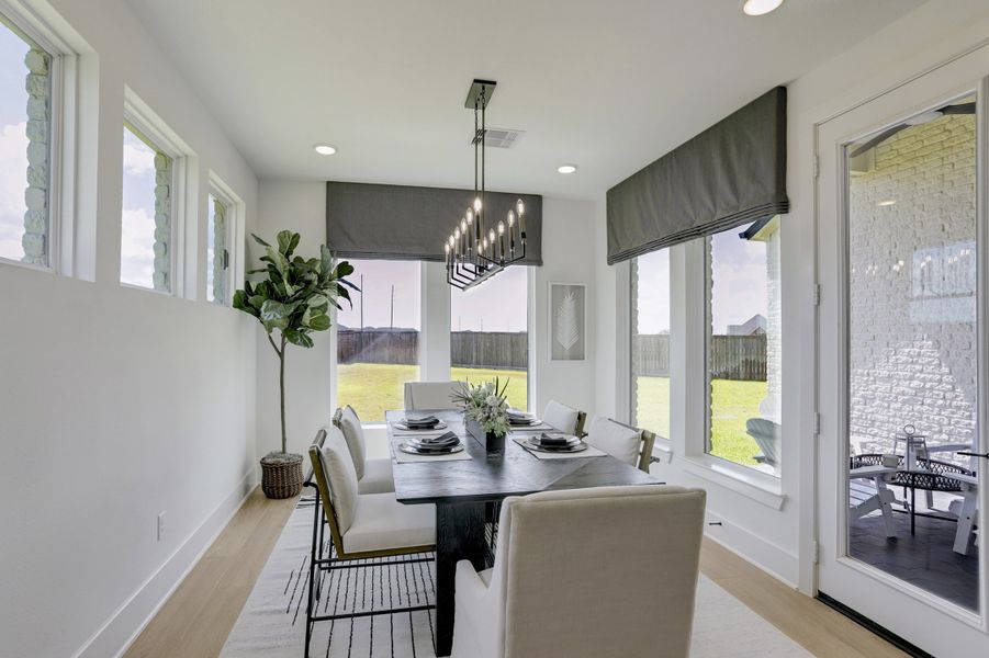 Furnished interior in a model home at Sunterra (Katy ISD) in Katy (Image 8).