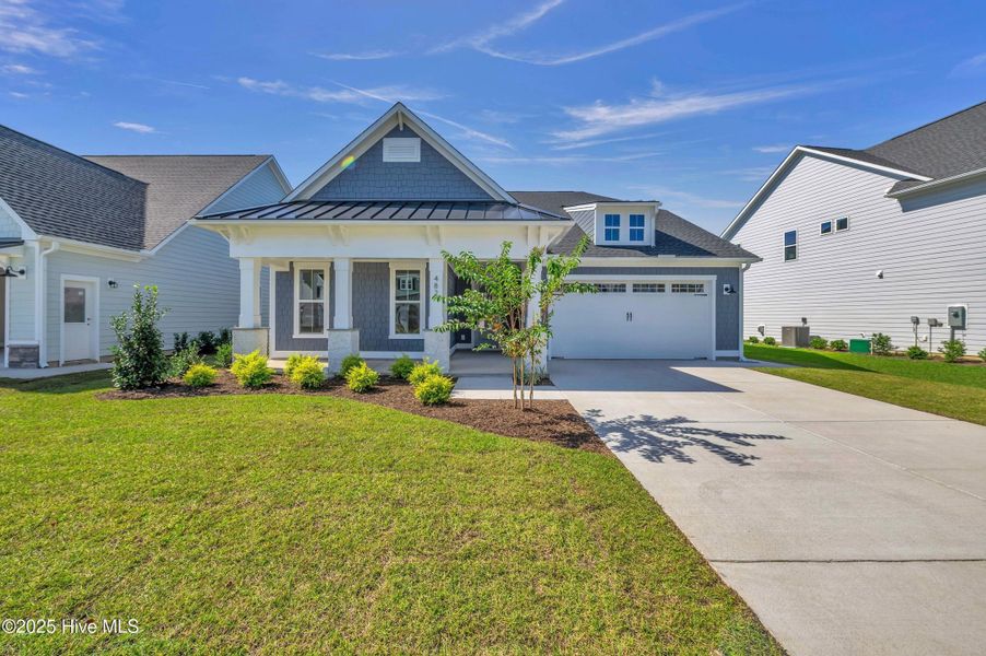 Front exterior of a home in the Windwater community, located in Hampstead, NC (Image 23). Front exterior of a home in the Windwater community, located in Hampstead, NC (Image 23).