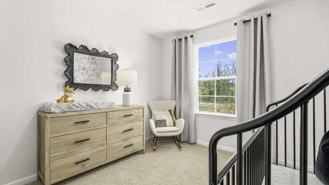 Furnished interior in a model home at Northbrooke Village in Madison (Image 17).