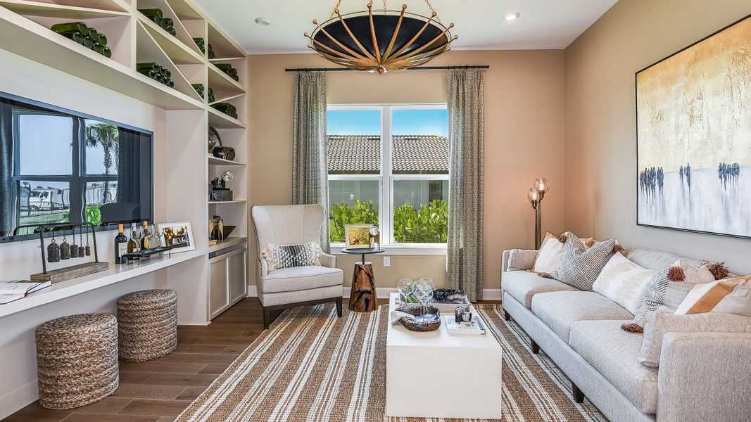 Furnished interior in a model home at Esplanade by the Islands in Naples (Image 75).