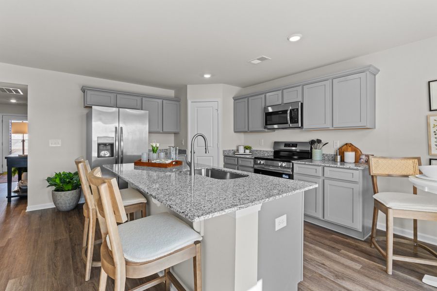 Furnished interior in a model home at Canary Woods in Hopkins (Image 8).