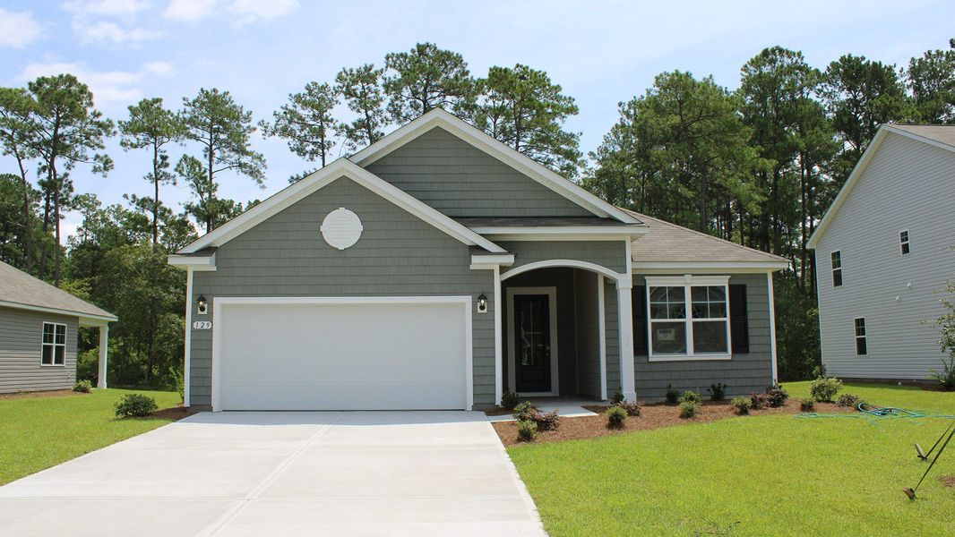 Front exterior of a home in the The Bluffs at Mill Creek community, located in Florence, SC (Image 15). Front exterior of a home in the The Bluffs at Mill Creek community, located in Florence, SC (Image 15).