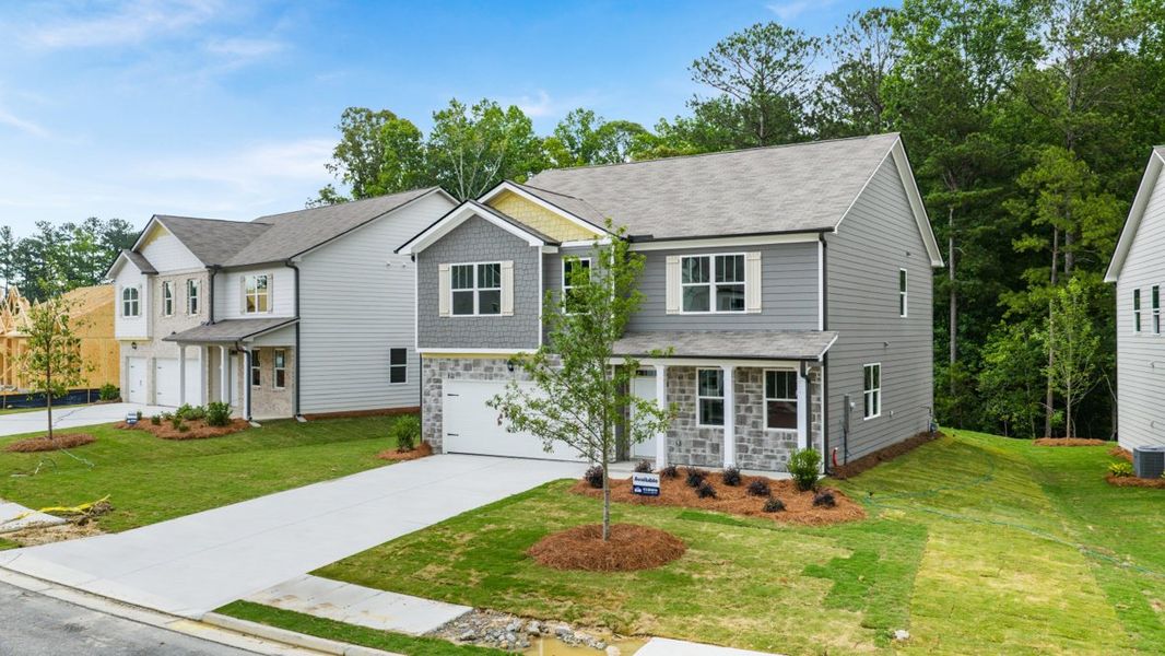 Front exterior of a home in the Northwoods at Mirror Lake community, located in Villa Rica, GA (Image 15).