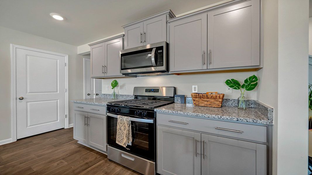 Furnished interior in a model home at Hunter's Branch in Hopkins (Image 6).