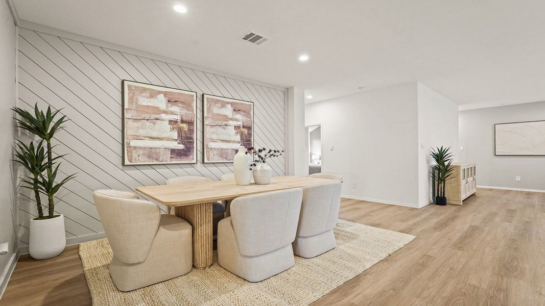 Furnished interior in a model home at Newport Pointe in Crosby (Image 30).