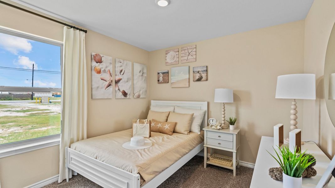 Furnished interior in a model home at The Cottages in Corpus Christi (Image 18).