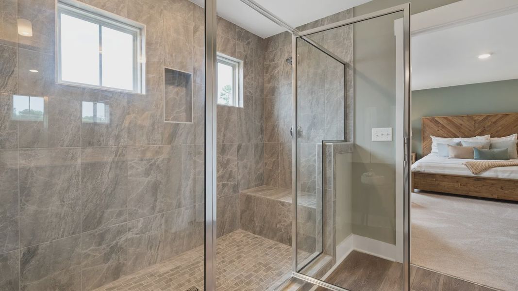 DRB Homes' Walnut Ridge primary bathroom with stunning tiled walk-in shower in Inman, SC